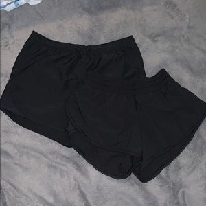 Two pairs of black shorts